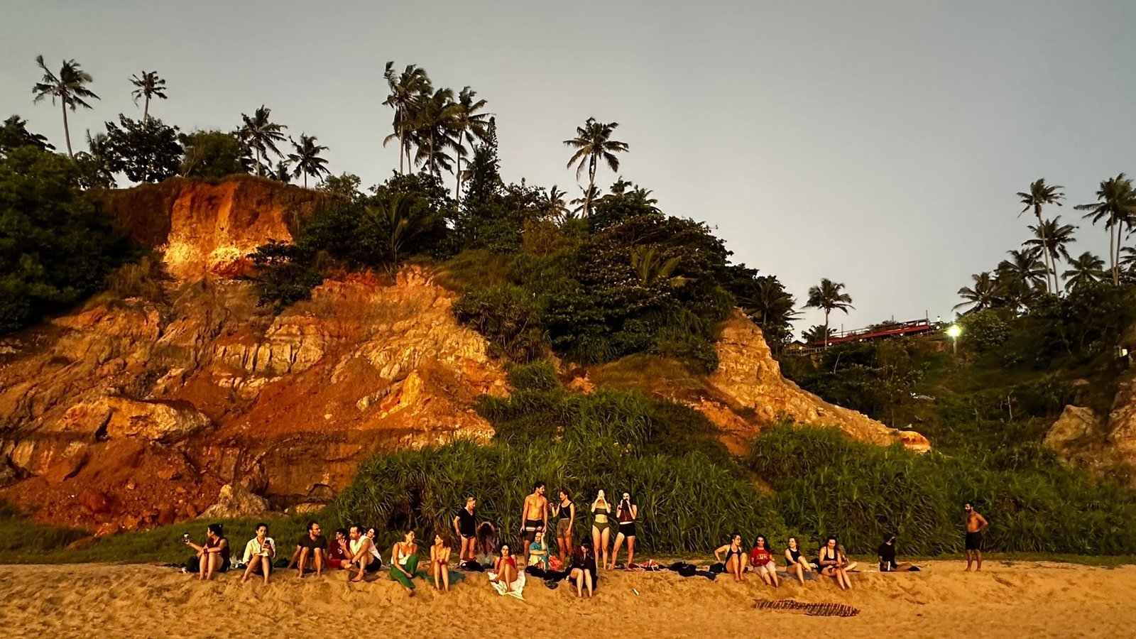 sunset-beach-gathering-yoga-students-varkala-kerala-devvrat-yoga-sangha